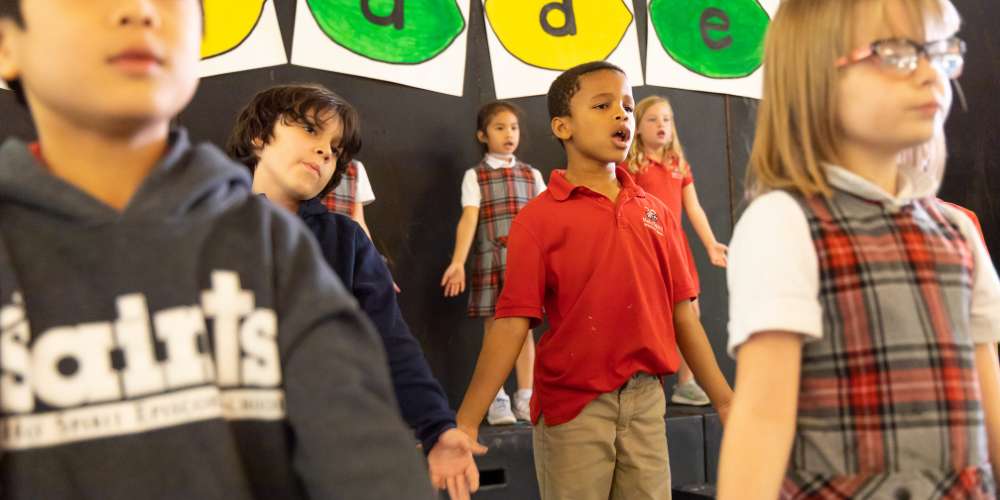 A group of students acting in a school play